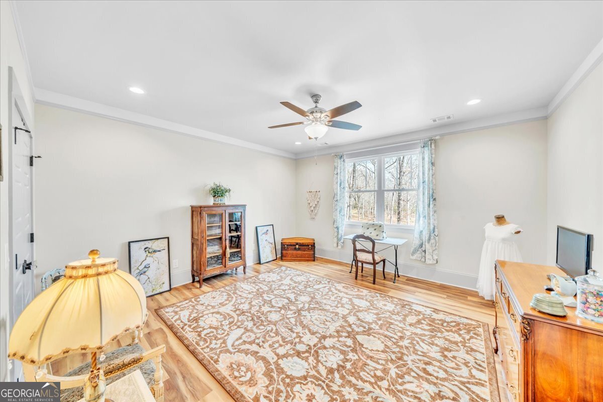 117 Pine Bough Trail Perry, GA 31069 - Photo 37 of 83 a living room with furniture and a flat screen tv