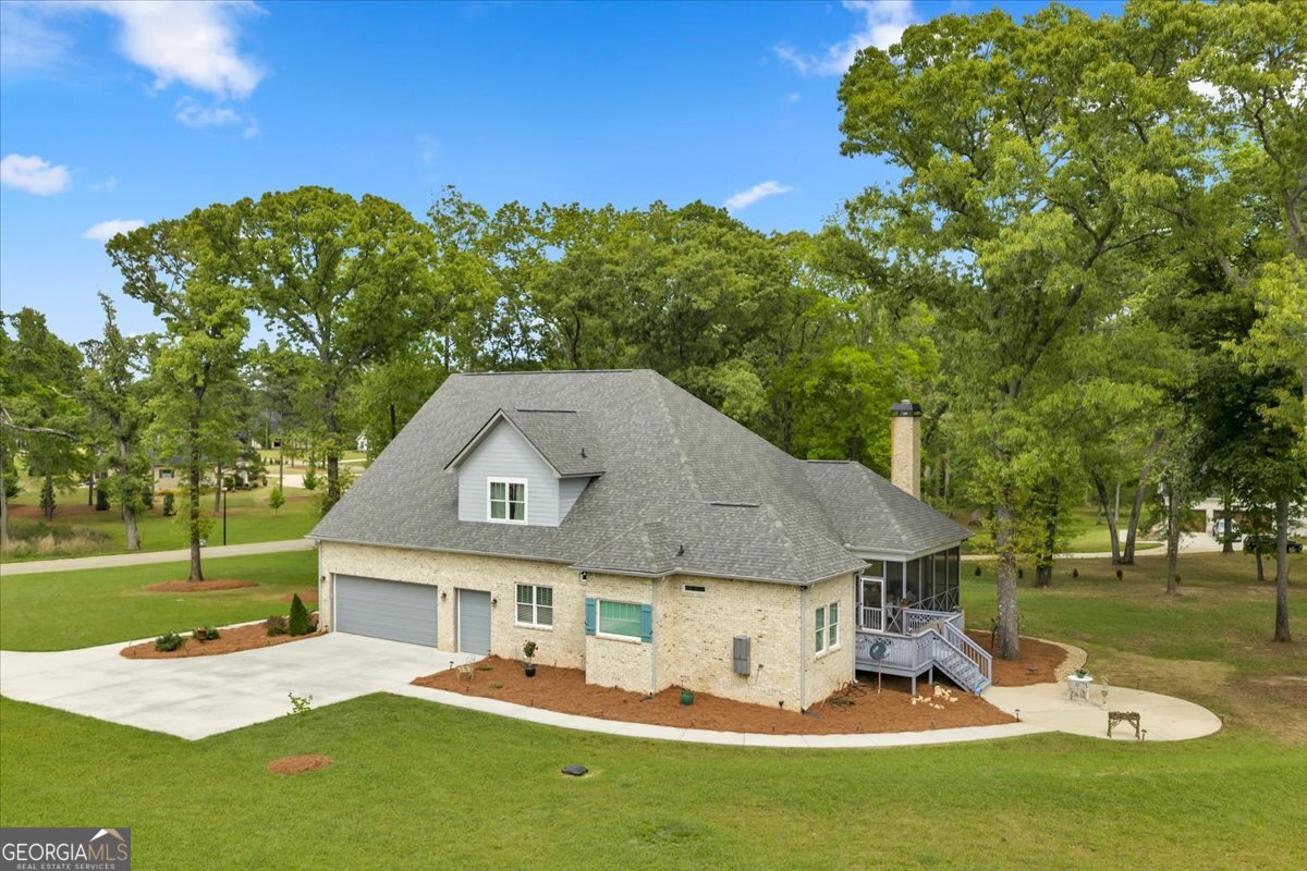 117 Pine Bough Trail Perry, GA 31069 - Photo 64 of 83 a view of a house with a backyard porch and sitting area