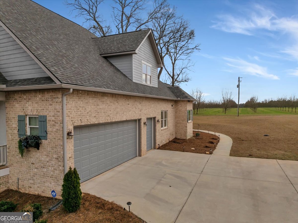 117 Pine Bough Trail Perry, GA 31069 - Photo 73 of 83 a front view of a house with lake view