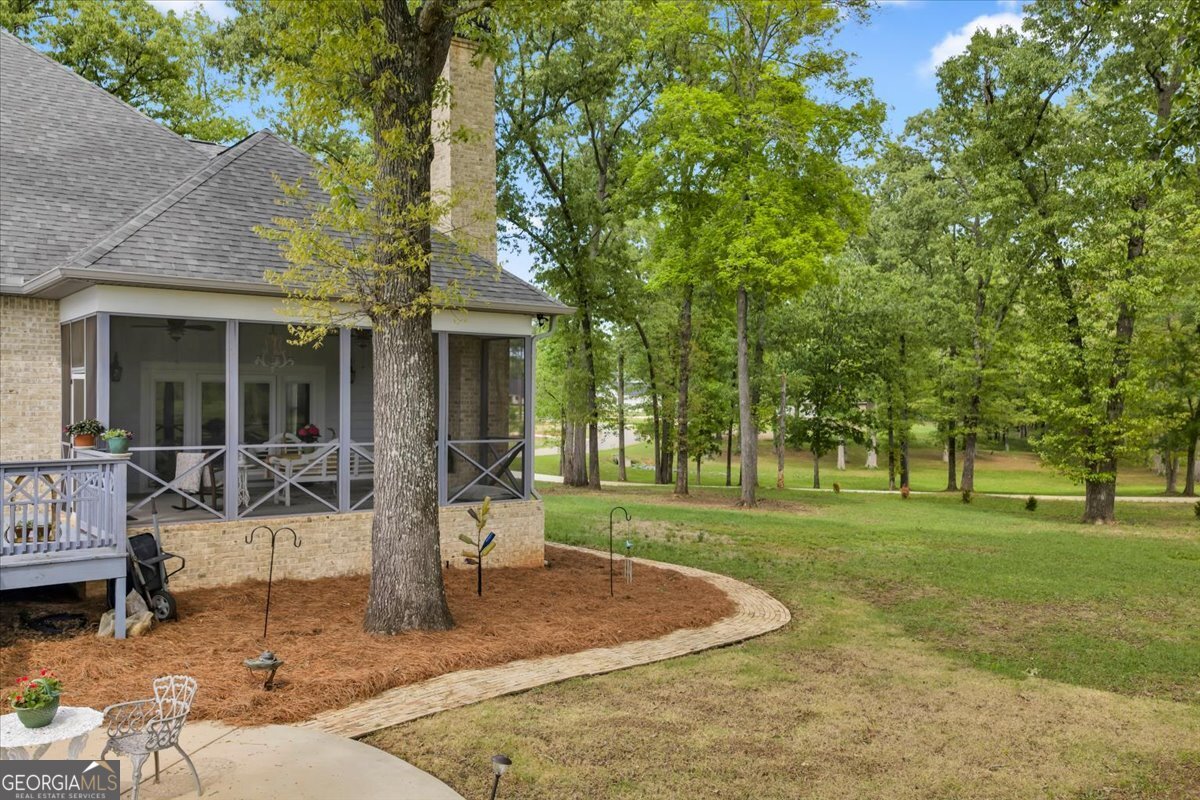 117 Pine Bough Trail Perry, GA 31069 - Photo 77 of 83 a view of a house with backyard and sitting area
