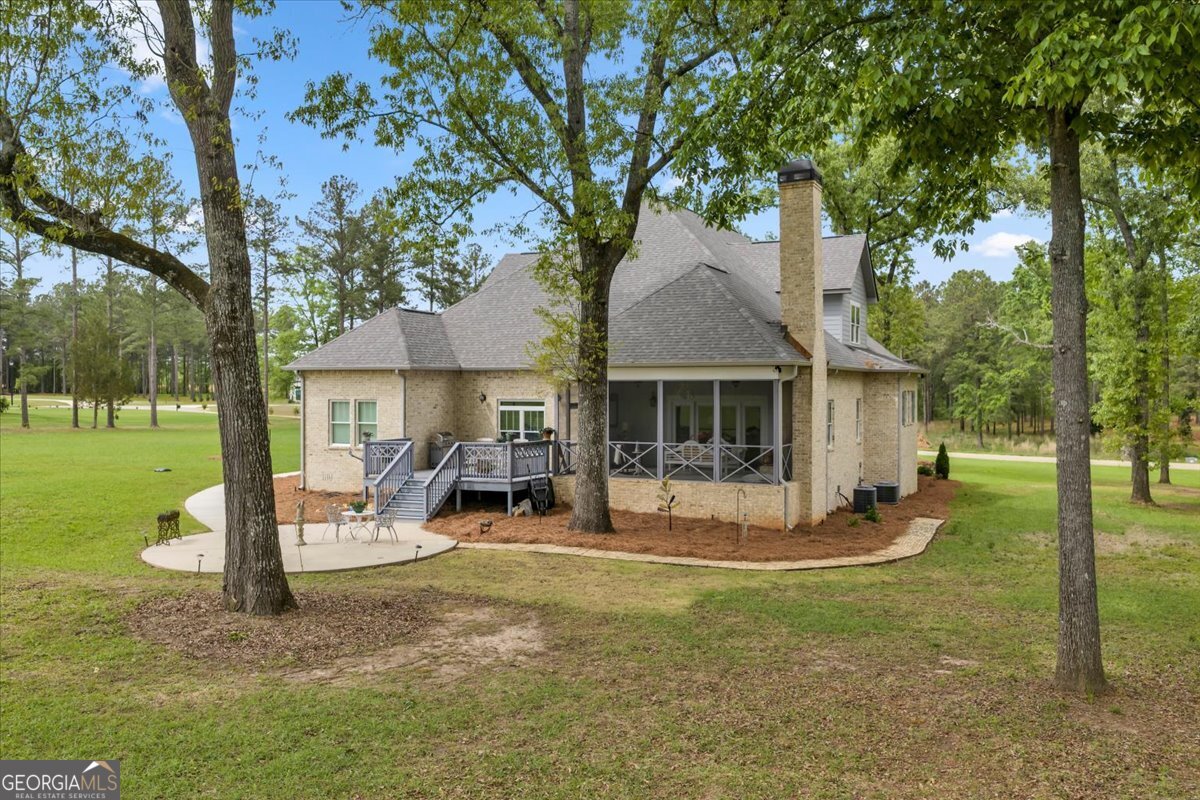 117 Pine Bough Trail Perry, GA 31069 - Photo 78 of 83 a view of a house with backyard porch and sitting area