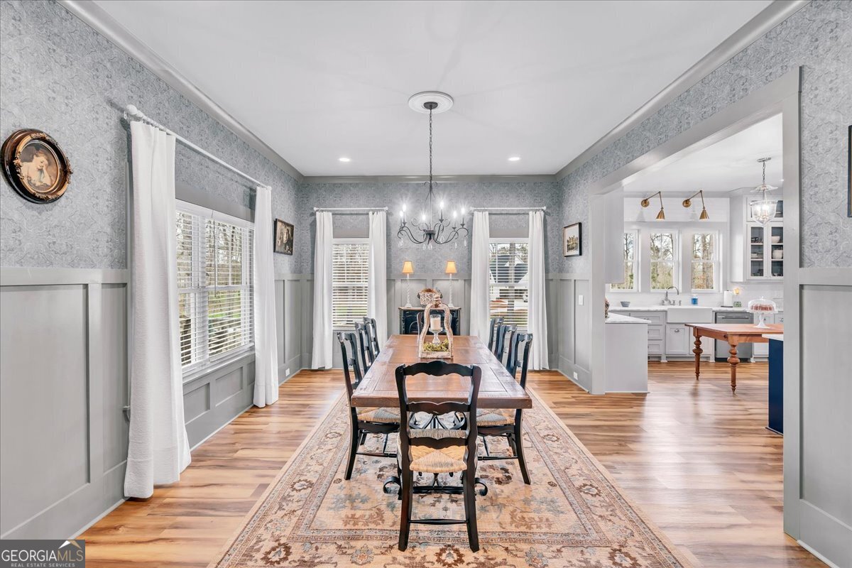 117 Pine Bough Trail Perry, GA 31069 - Photo 9 of 83 a view of a livingroom with furniture window and wooden floor