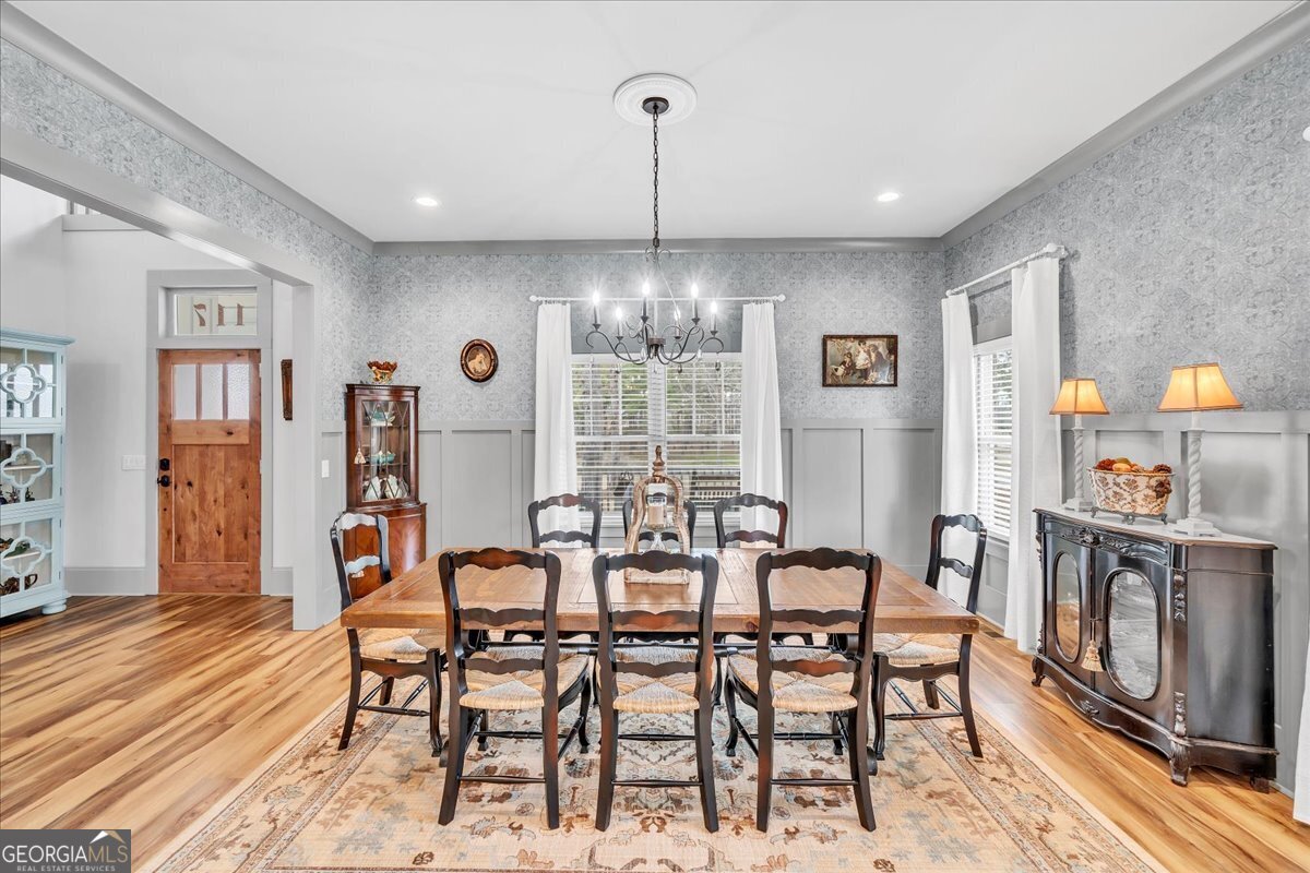 117 Pine Bough Trail Perry, GA 31069 - Photo 10 of 83 a view of a dining room with furniture window and wooden floor