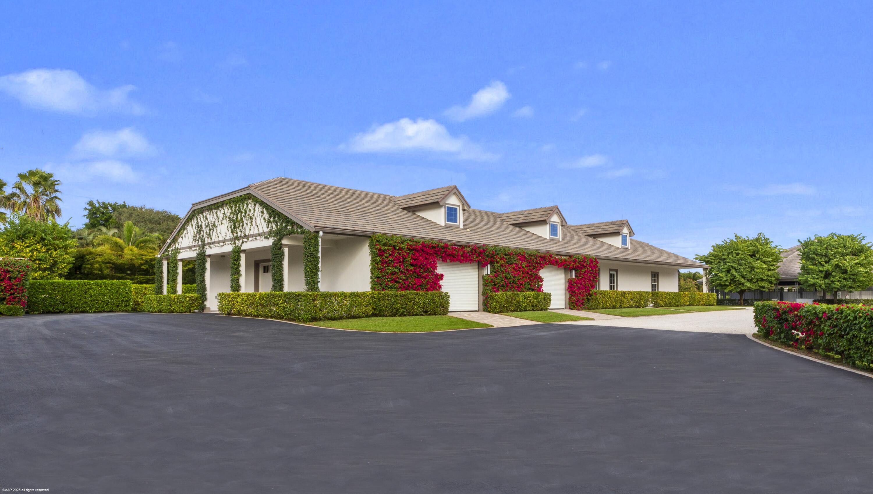 15527 Imperial Point Lane Wellington, FL 33414 - Photo 104 of 184 a front view of house with yard and green space
