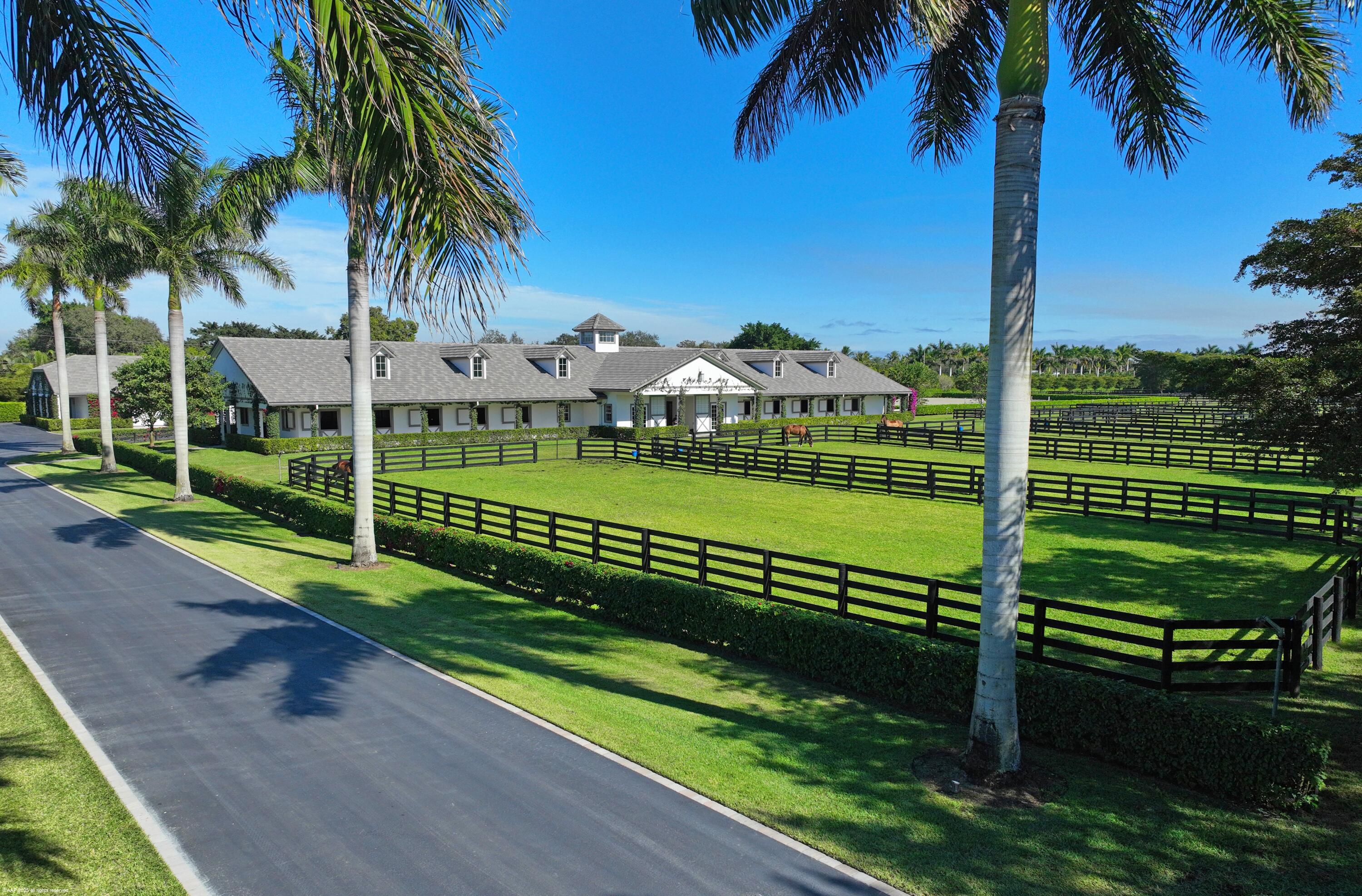 15527 Imperial Point Lane Wellington, FL 33414 - Photo 107 of 184 a view of a park with palm trees
