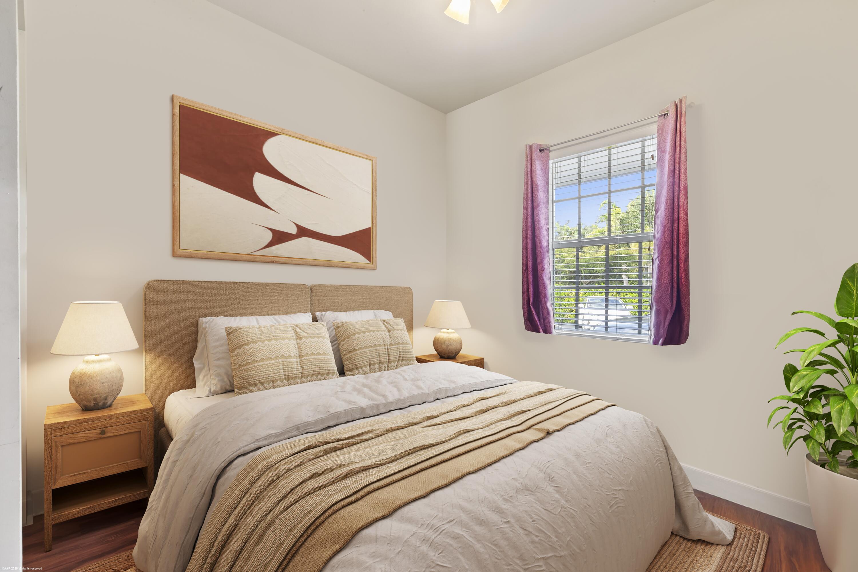 15527 Imperial Point Lane Wellington, FL 33414 - Photo 159 of 184 a bedroom with a bed and a painting on the wall