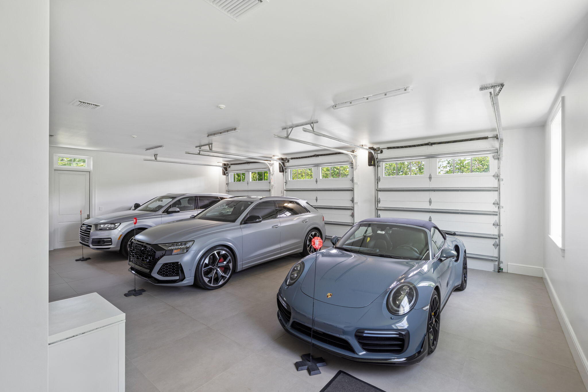 15527 Imperial Point Lane Wellington, FL 33414 - Photo 167 of 184 a car parked in a garage