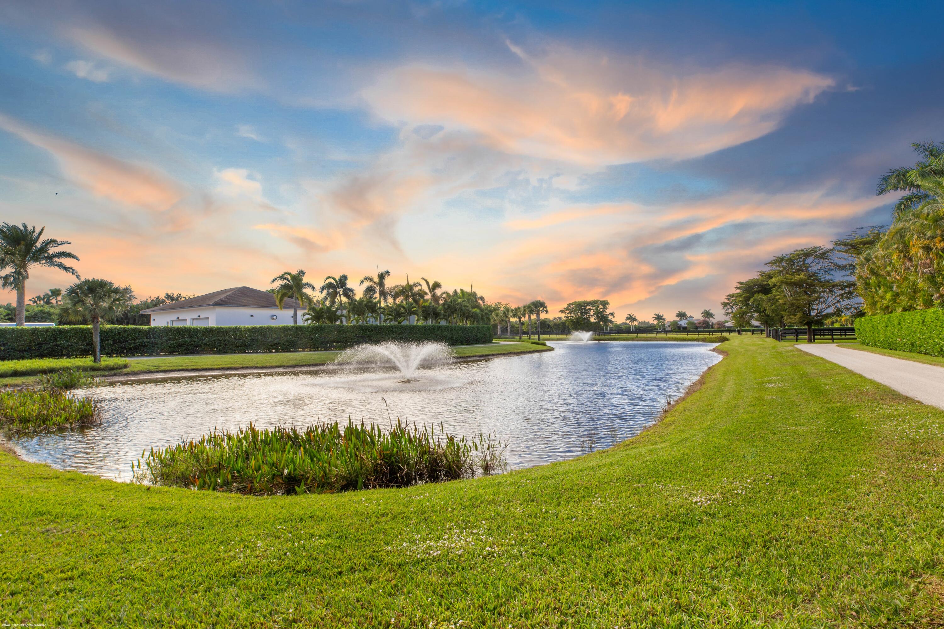15527 Imperial Point Lane Wellington, FL 33414 - Photo 168 of 184 a view of a lake from a yard