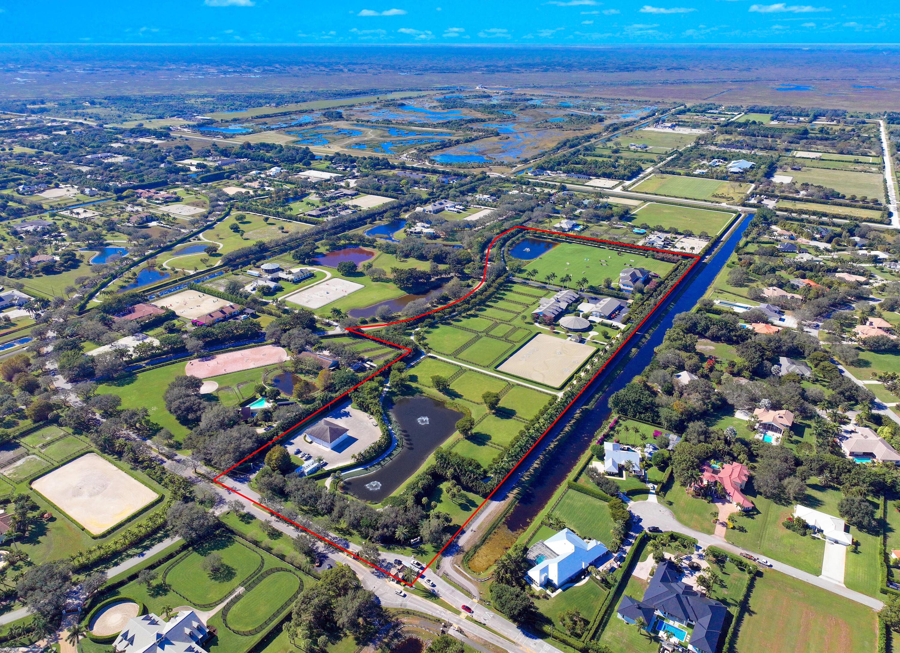 15527 Imperial Point Lane Wellington, FL 33414 - Photo 183 of 184 an aerial view of a city
