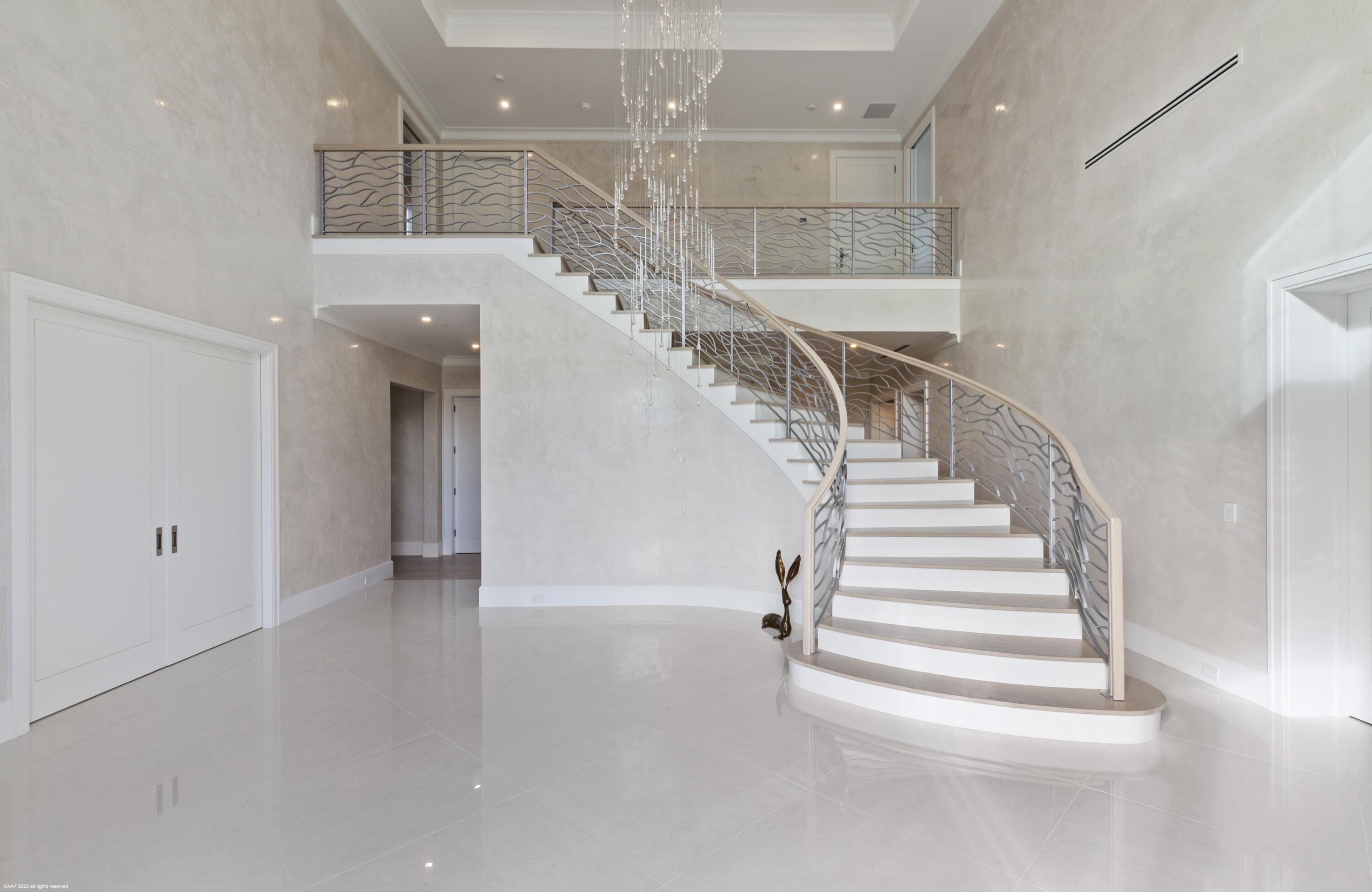 15527 Imperial Point Lane Wellington, FL 33414 - Photo 26 of 184 a view of entryway and hall with a front door
