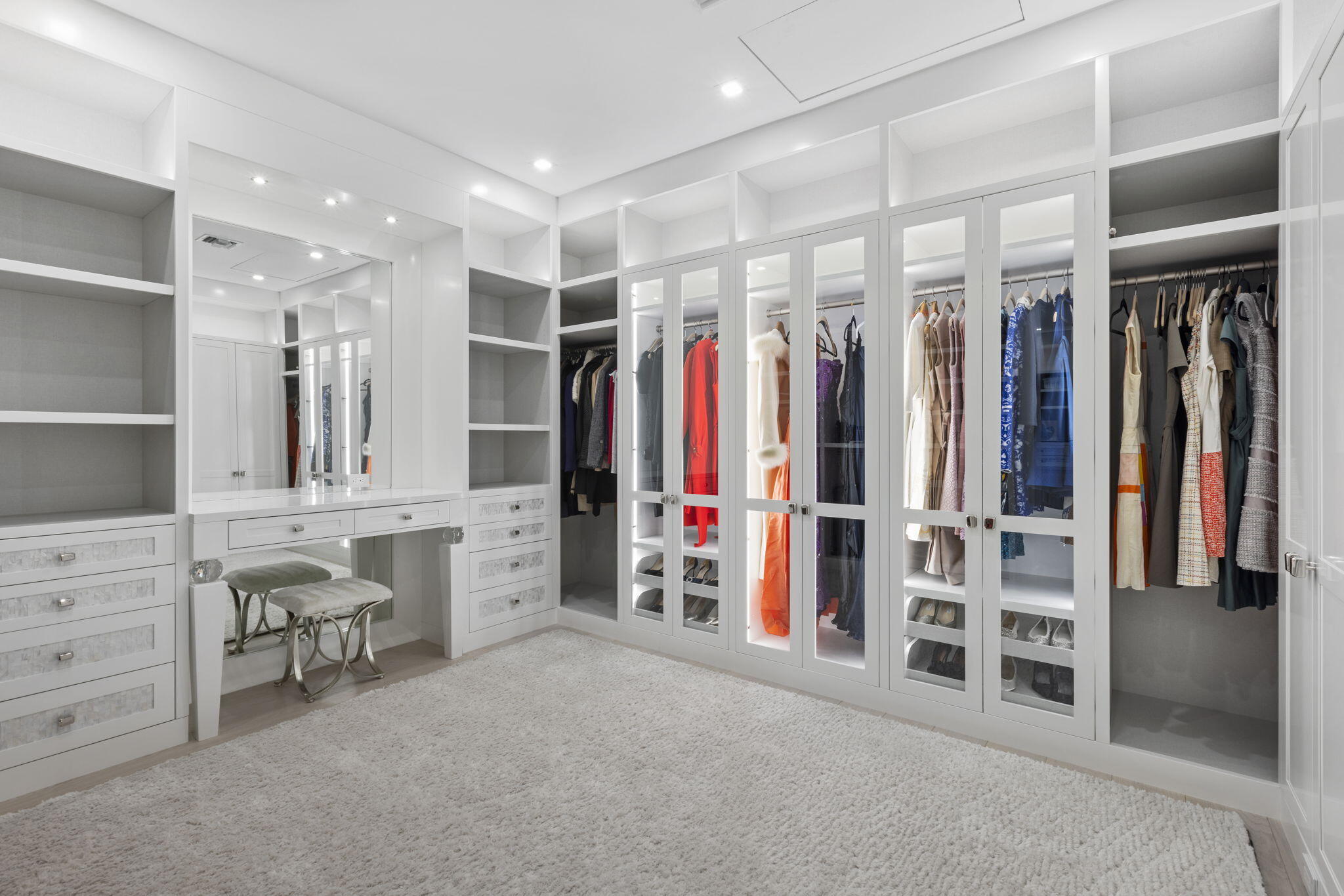 15527 Imperial Point Lane Wellington, FL 33414 - Photo 54 of 184 a view of walk in closet with furniture