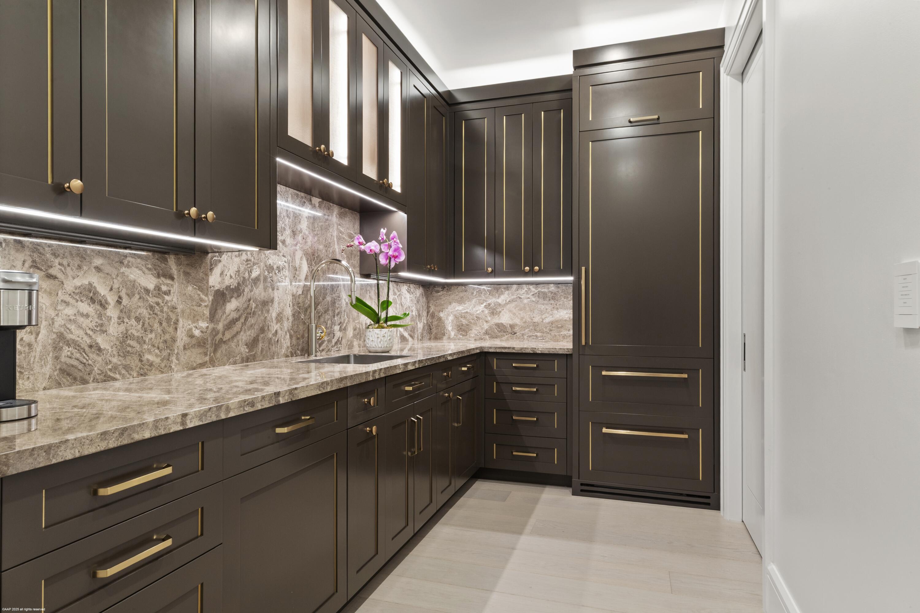 15527 Imperial Point Lane Wellington, FL 33414 - Photo 77 of 184 a kitchen with stainless steel appliances granite countertop a refrigerator and a sink