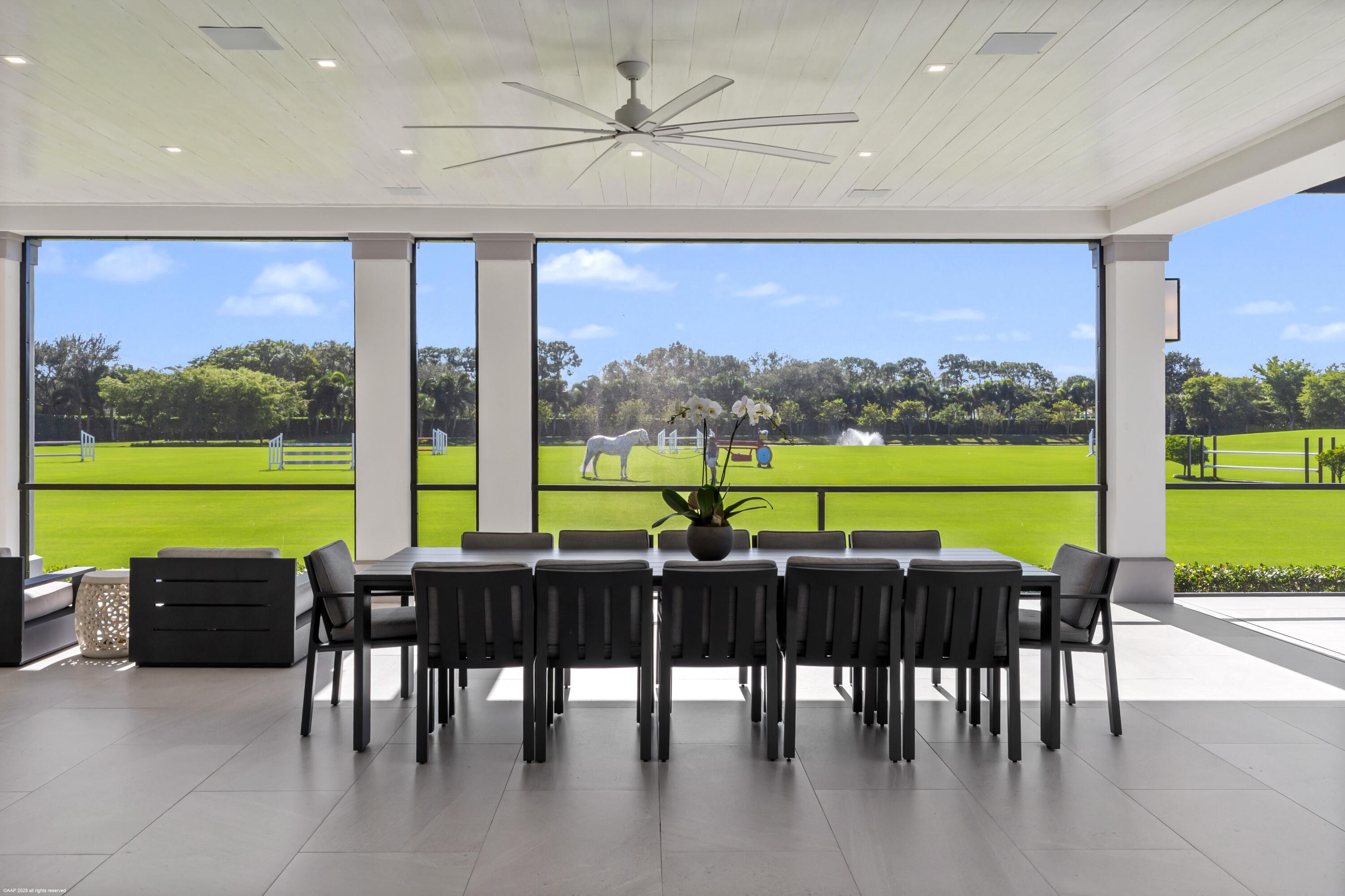 15527 Imperial Point Lane Wellington, FL 33414 - Photo 82 of 184 a view of a dining room with furniture window and outside view