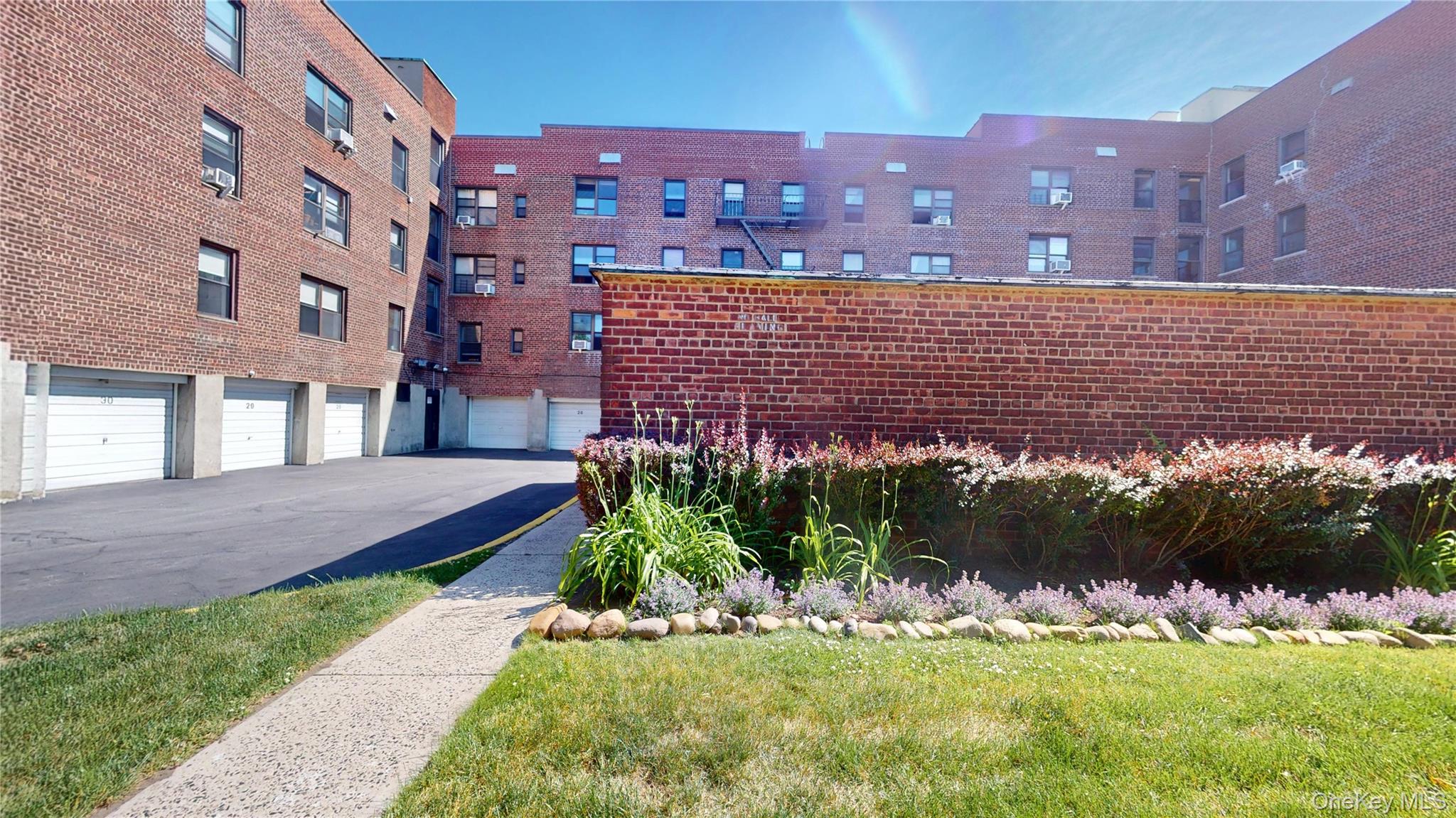 52-21 39th Road, Unit 2A Queens, NY 11377 - Photo 18 of 21 interior courtyard/driveway
