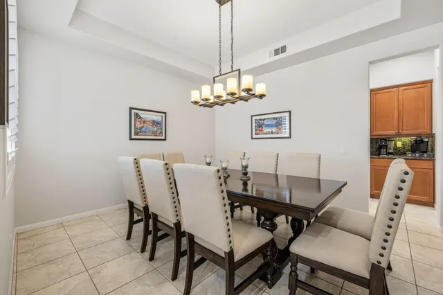 a room with gym equipment and windows