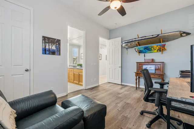 a view of a patio with a table and chairs