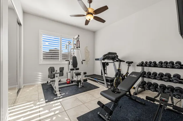 a view of a lake with houses in the back