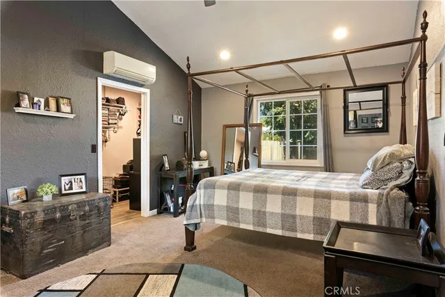 a bathroom with a sink toilet a mirror and shower