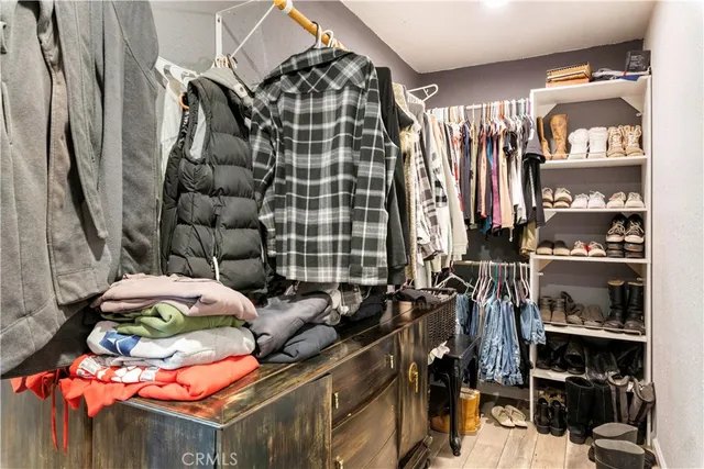 a view of a house with large windows