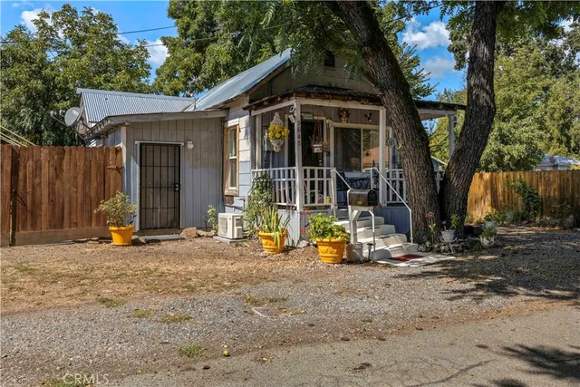 a utility room with sink dryer and washer