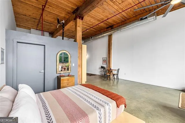 a kitchen with a sink and a refrigerator