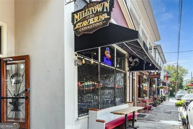 a view of a building with sitting area