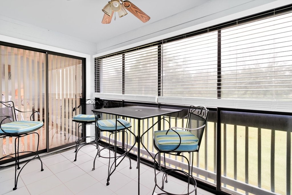 9637 Riverside Drive, Unit 3 Sebastian, FL 32958 - Photo 20 of 36 a view of a chairs and table in a room