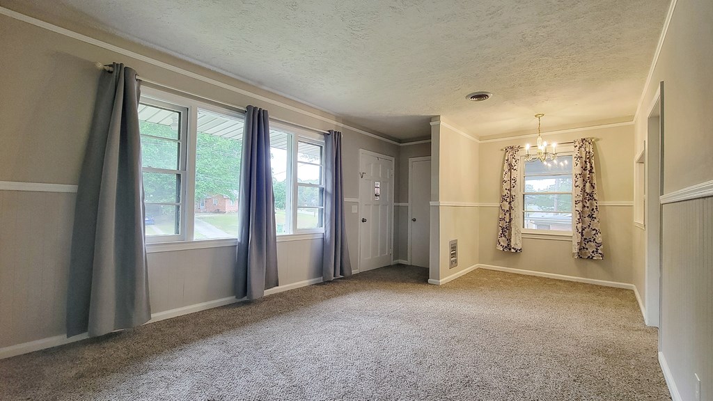 5552 Perry Avenue Columbus, GA 31909 - Photo 4 of 14 a view of empty room with windows