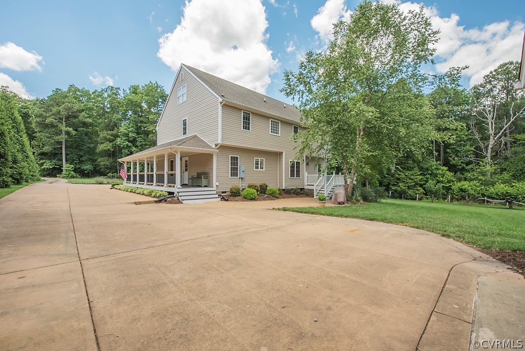 11710 Taplow Road Midlothian, VA 23112 - Photo 11 of 48 a house with trees in the background