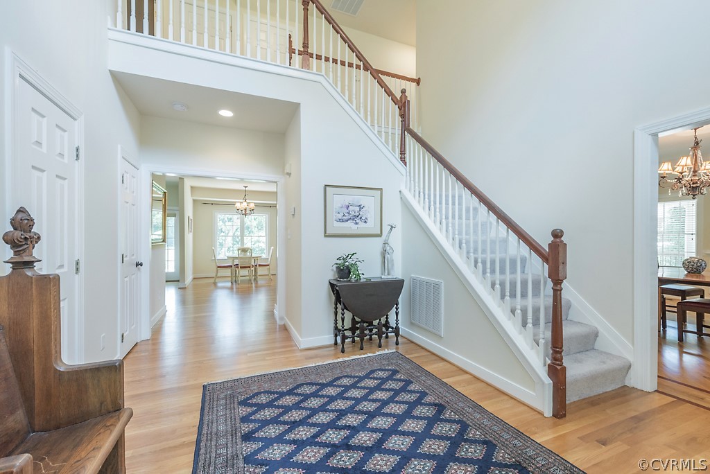 11710 Taplow Road Midlothian, VA 23112 - Photo 17 of 48 a view of entryway and hall with wooden floor