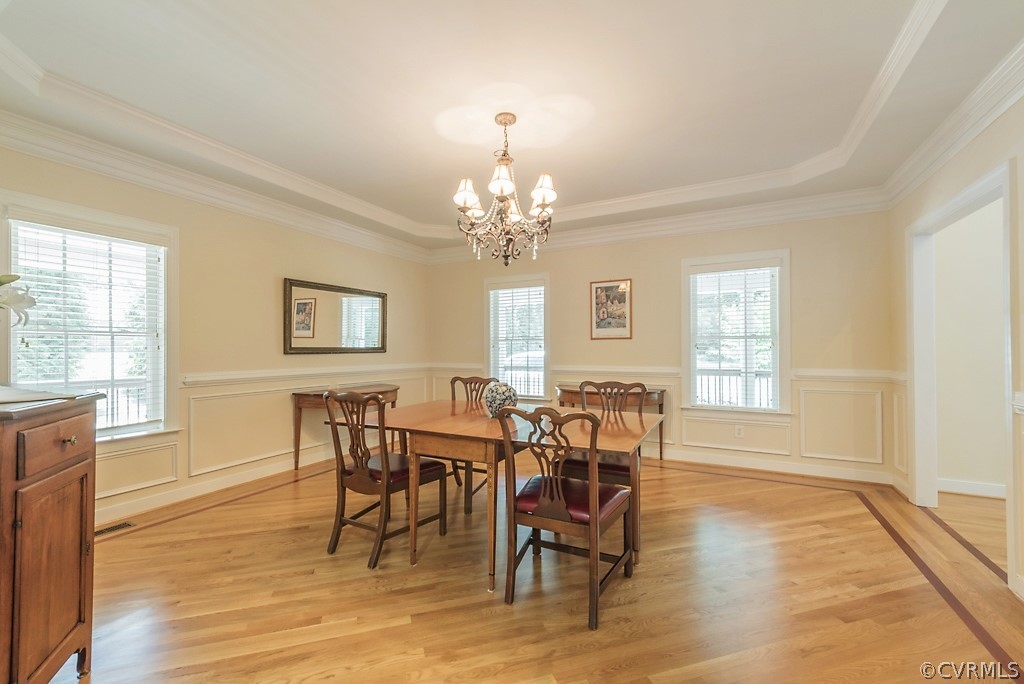 11710 Taplow Road Midlothian, VA 23112 - Photo 18 of 48 a view of a dining room with furniture and wooden floor