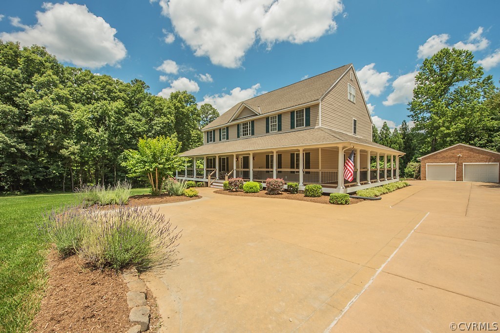 11710 Taplow Road Midlothian, VA 23112 - Photo 2 of 48 a front view of a house with a yard