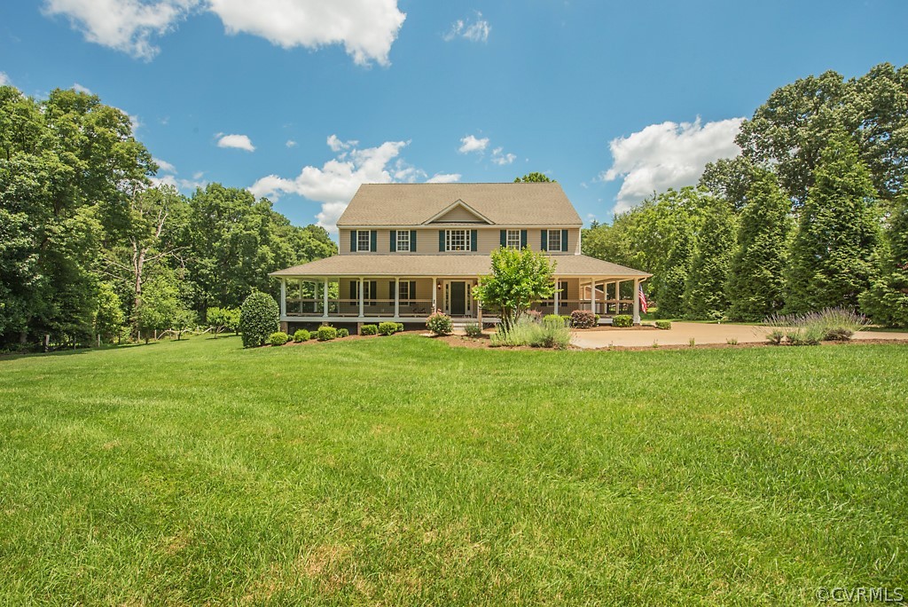 11710 Taplow Road Midlothian, VA 23112 - Photo 3 of 48 a front view of a house with a yard