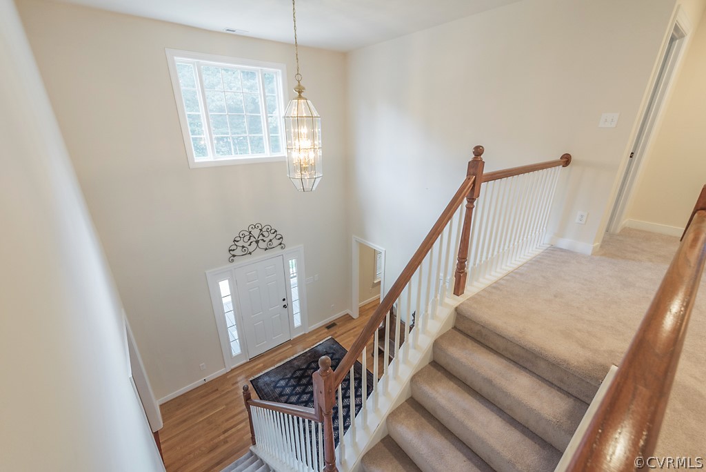 11710 Taplow Road Midlothian, VA 23112 - Photo 31 of 48 a view of entryway and hall with wooden floor