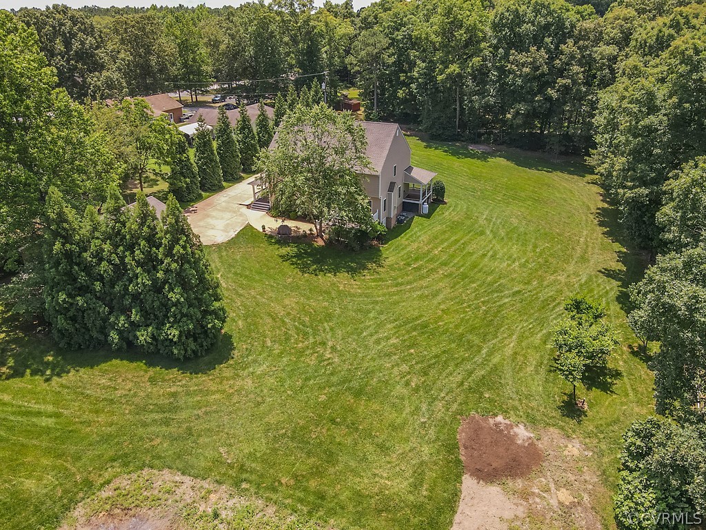 11710 Taplow Road Midlothian, VA 23112 - Photo 45 of 48 a view of a lake with a yard