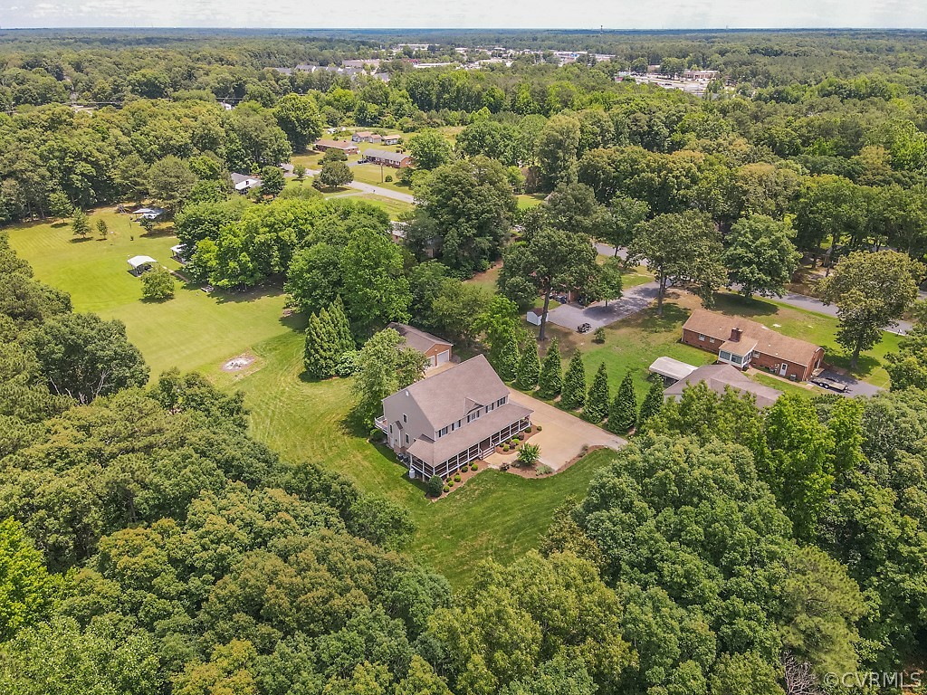 11710 Taplow Road Midlothian, VA 23112 - Photo 46 of 48 an aerial view of residential houses with outdoor space and trees