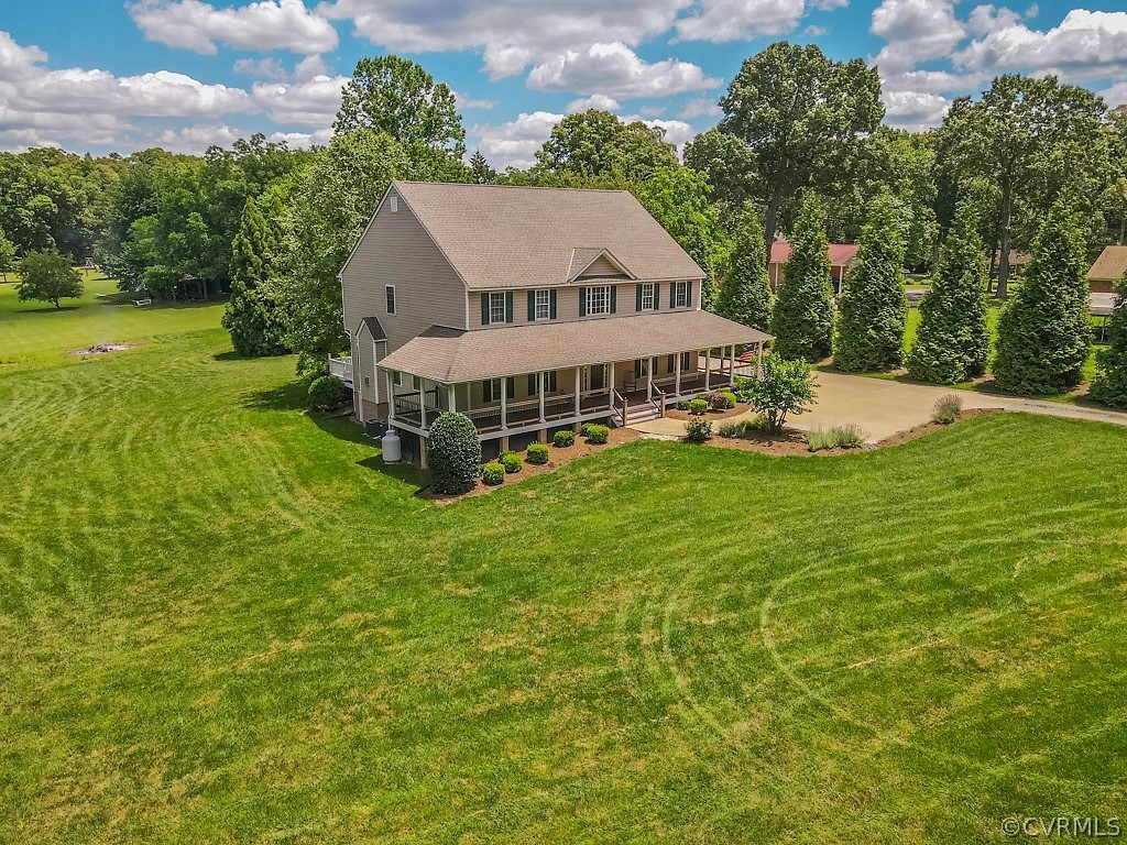 11710 Taplow Road Midlothian, VA 23112 - Photo 5 of 48 an aerial view of a house with swimming pool and garden