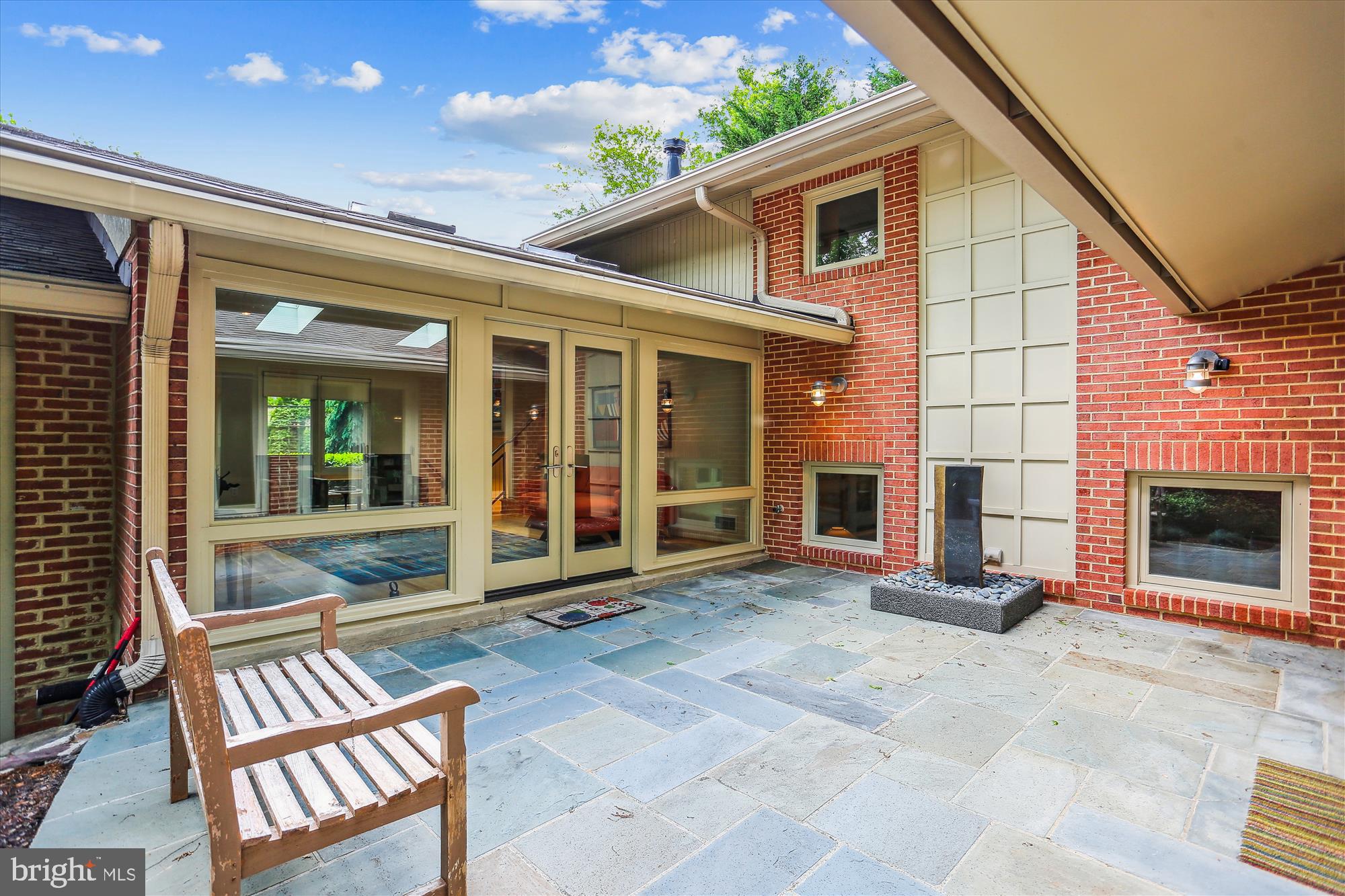 9517 Starmont Road Bethesda, MD 20817 - Photo 19 of 65 Large Stone Terrace with a Water Fountain