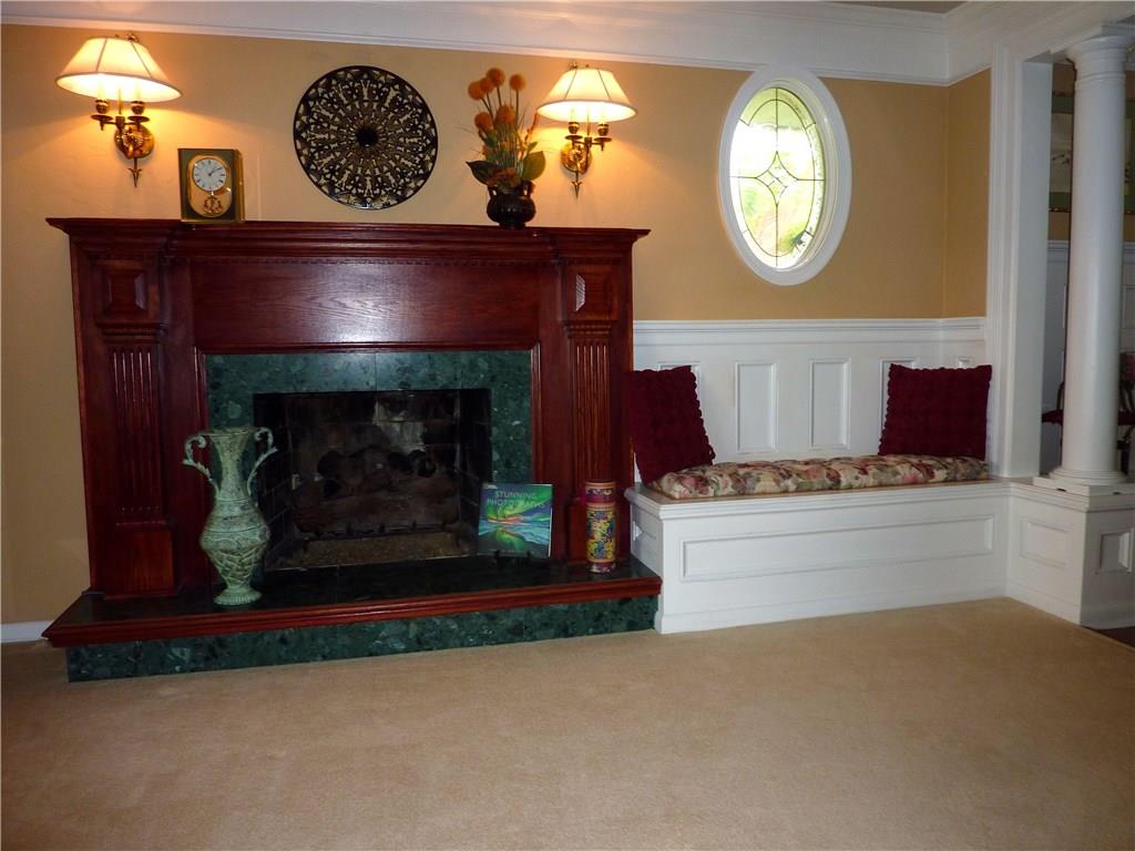 50 Bellview Circle McKees Rocks, PA 15136 - Photo 7 of 24 NOTICE THE TRIM ON FP AND the bench seat does open for storage.