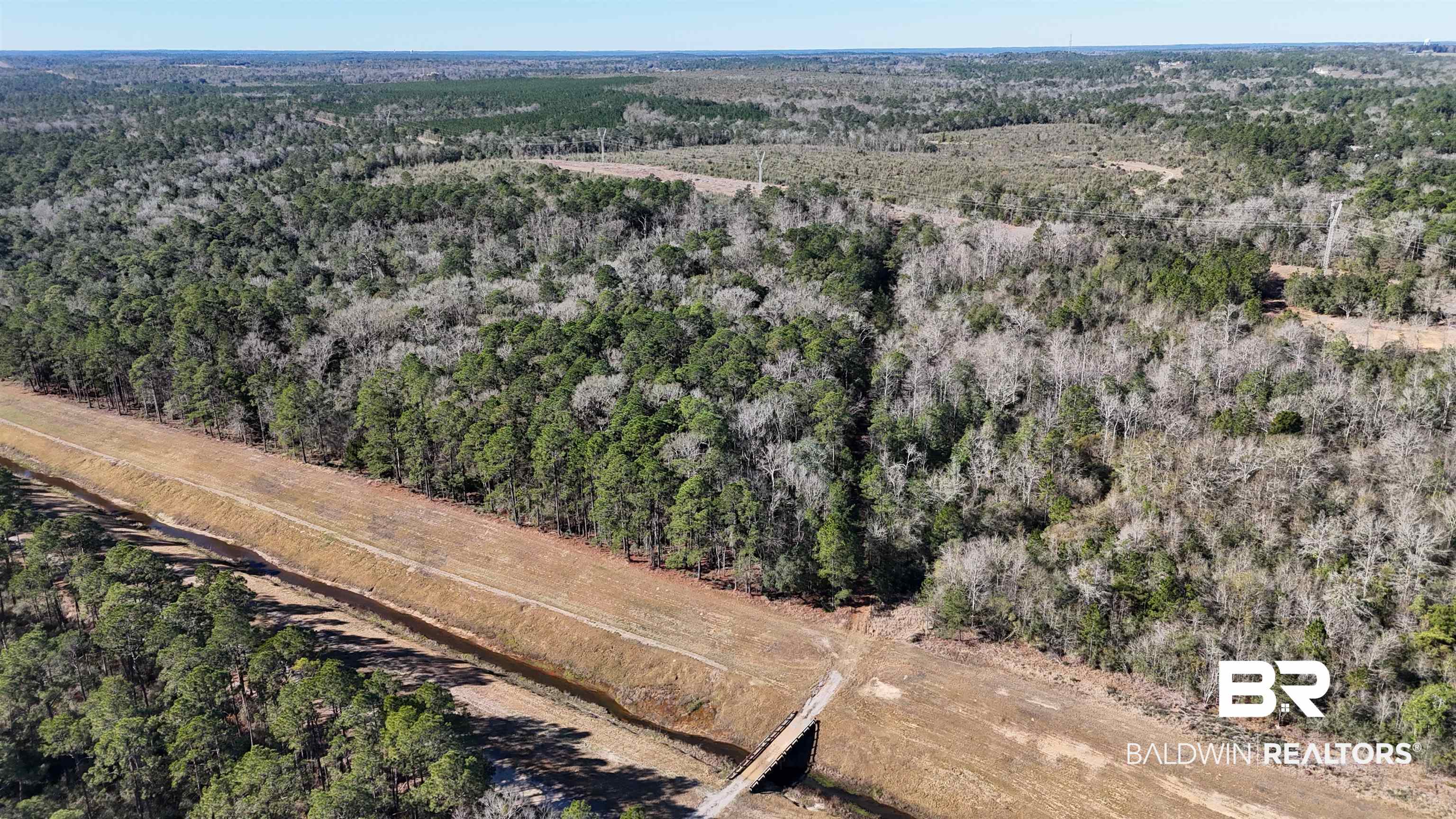 0 Radcliff Road Saraland, AL 36571 - Photo 8 of 14 Aerial view of property's location with a heavily wooded area
