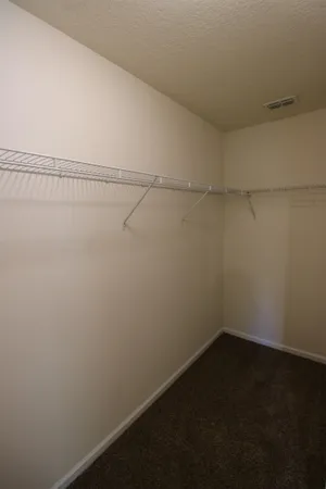 a view of a room with racks on the wall