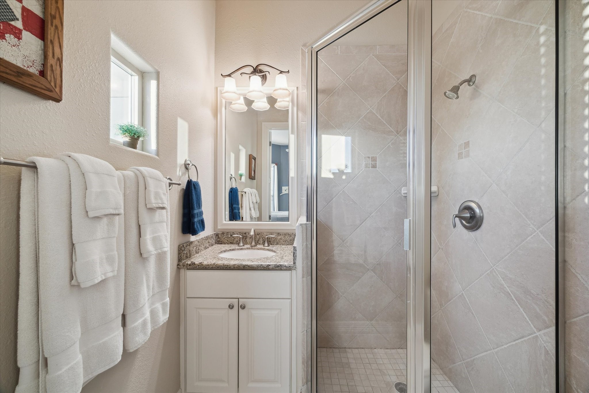 1406 Todville Road Seabrook, TX 77586 - Photo 40 of 50 EN-SUITE BATH WITH A WALK-IN SHOWER WITH TILE SURROUND.