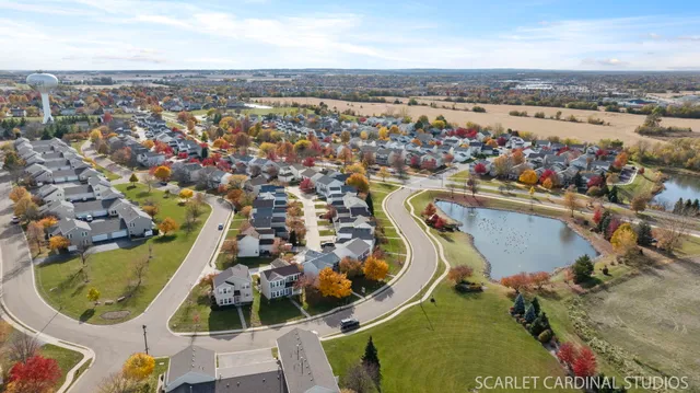 an aerial view of a swimming pool with outdoor space
