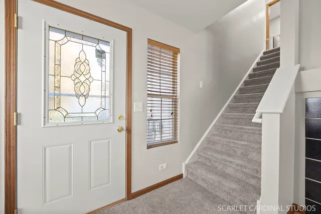 a view of an entryway with staircase