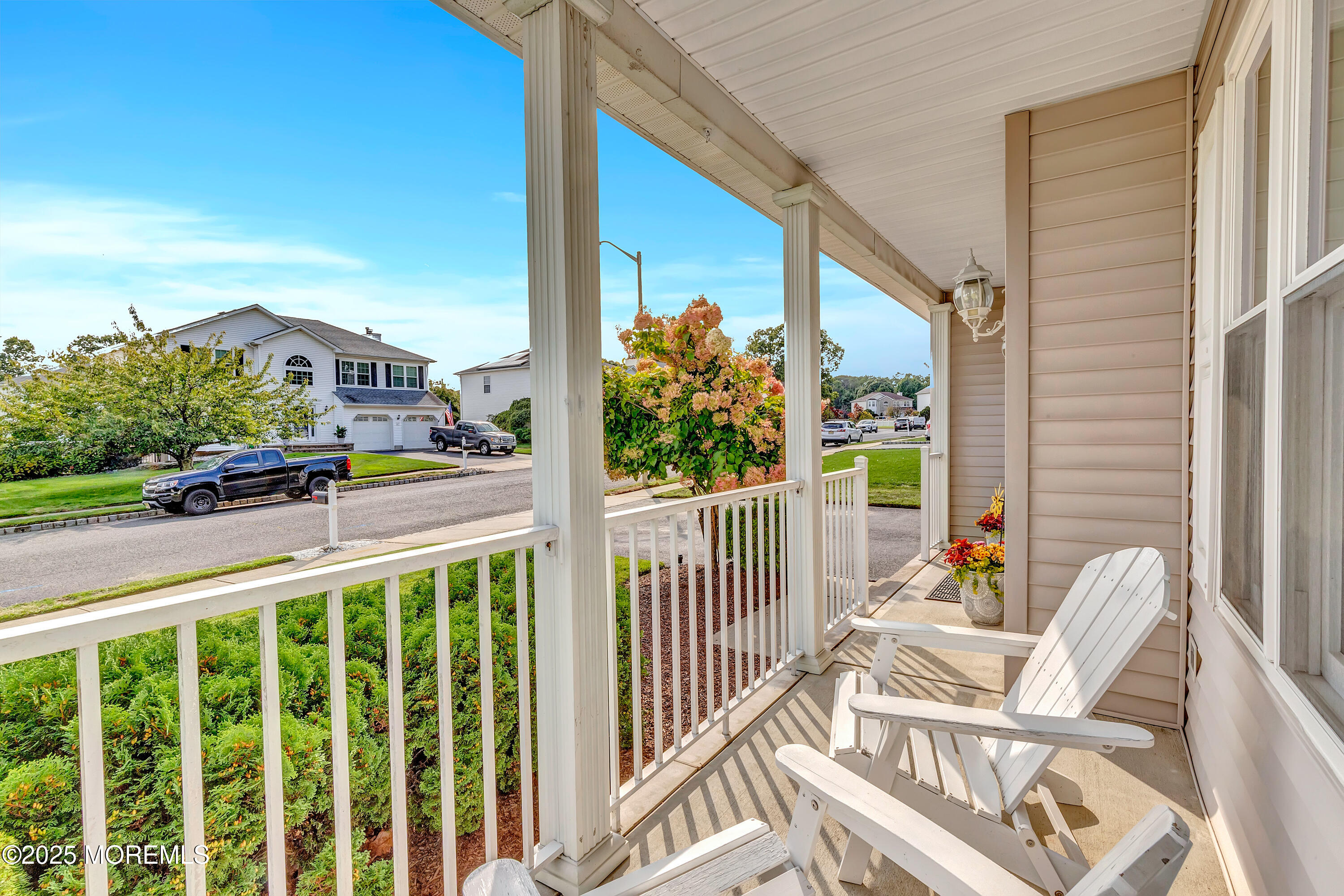 66 Diamond Lane Howell, NJ 07731 - Photo 3 of 47 a view of a balcony with chairs