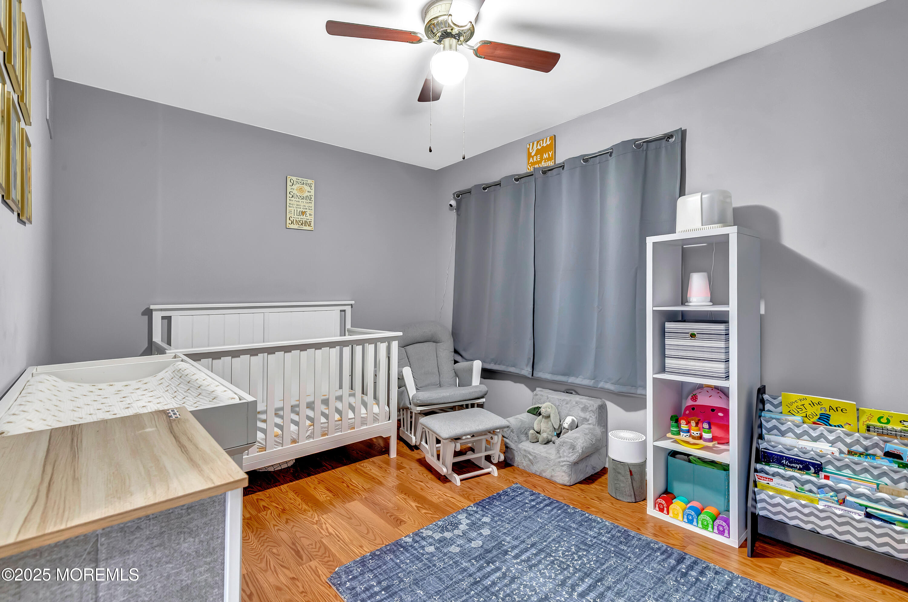 66 Diamond Lane Howell, NJ 07731 - Photo 31 of 47 a bedroom with furniture and a book shelf