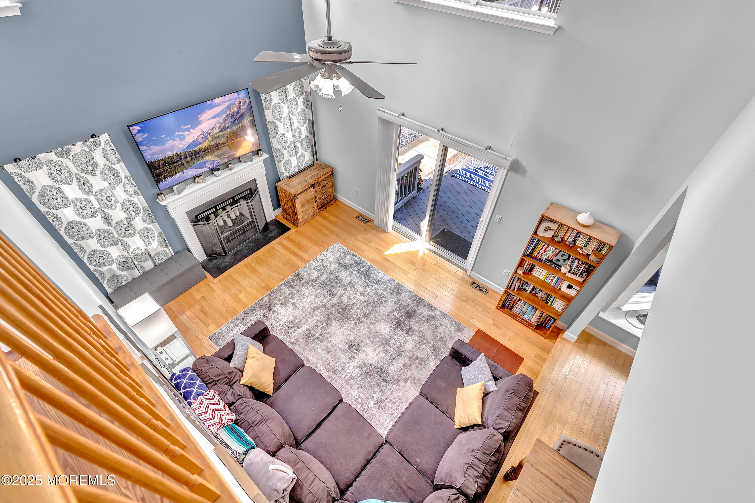 66 Diamond Lane Howell, NJ 07731 - Photo 33 of 47 a living room with furniture and a chandelier