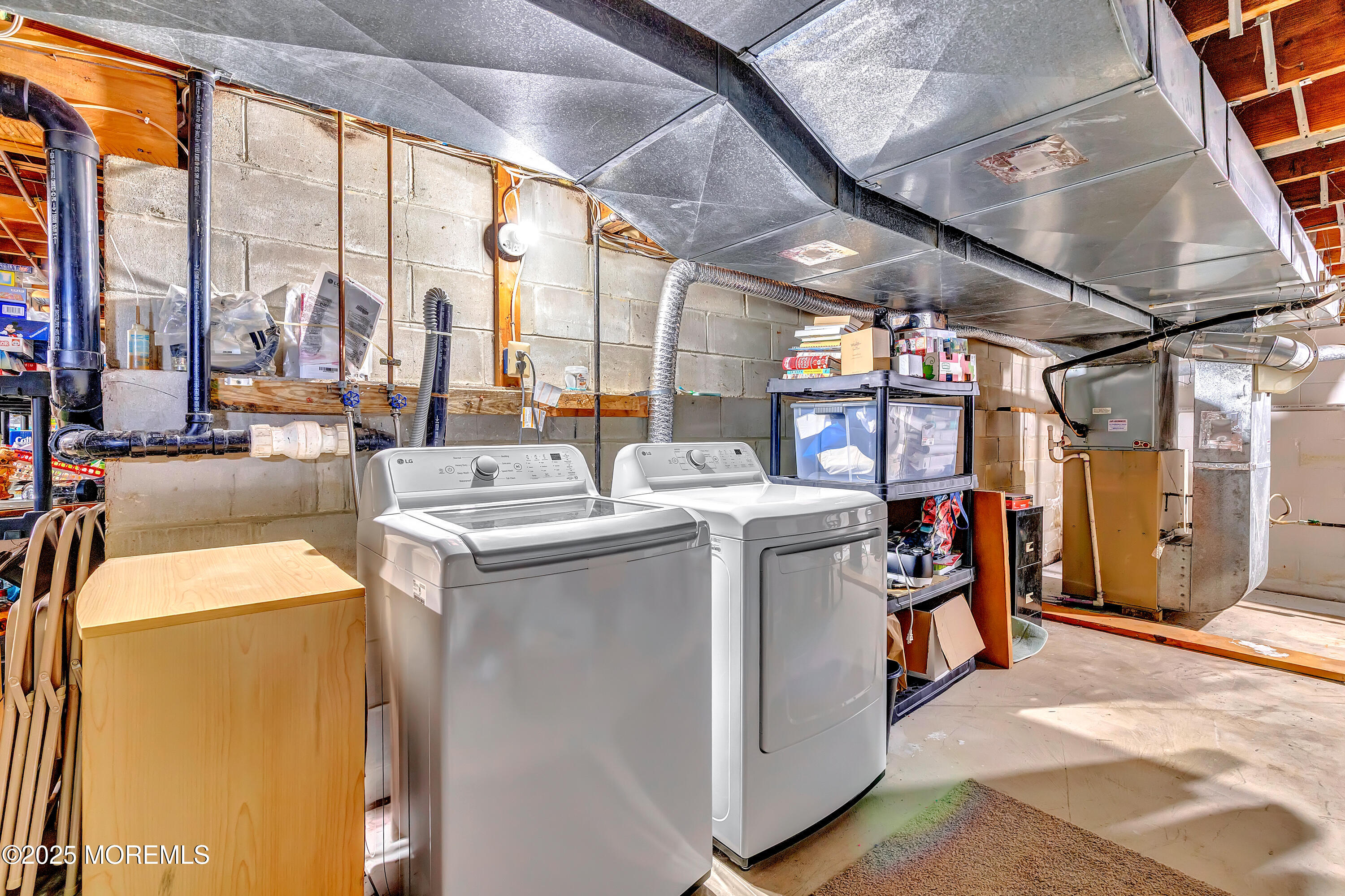 66 Diamond Lane Howell, NJ 07731 - Photo 35 of 47 a utility room with dryer and washer