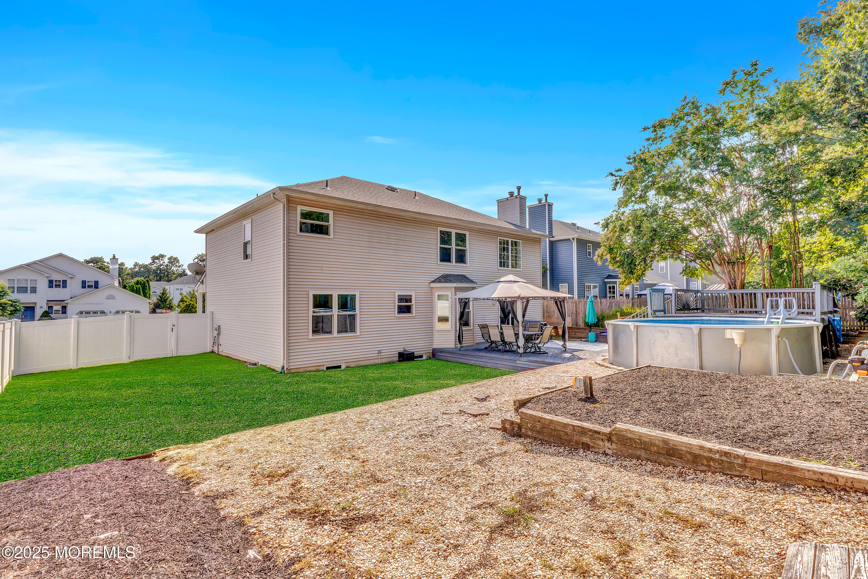 66 Diamond Lane Howell, NJ 07731 - Photo 36 of 47 a view of a back yard of the house