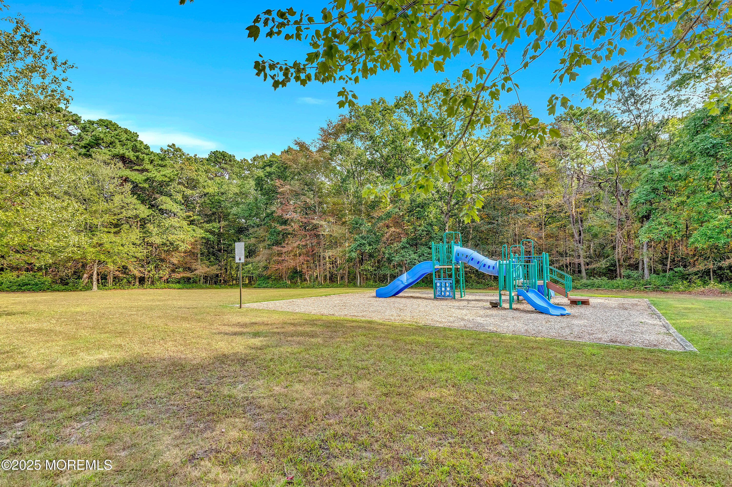66 Diamond Lane Howell, NJ 07731 - Photo 43 of 47 a view of an empty room with a yard
